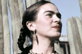 Artist Frida Kahlo poses for a portrait at the home and studio she shares with her husband, Diego Rivera