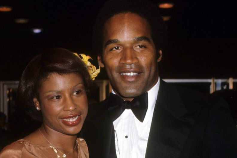 O.J. Simpson and Marguerite Whitley Simpson at a movie premiere