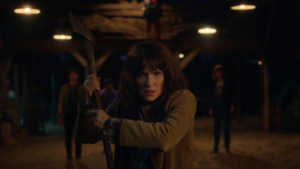 Winona Ryder holds an ax in Stranger Things Season 5.
