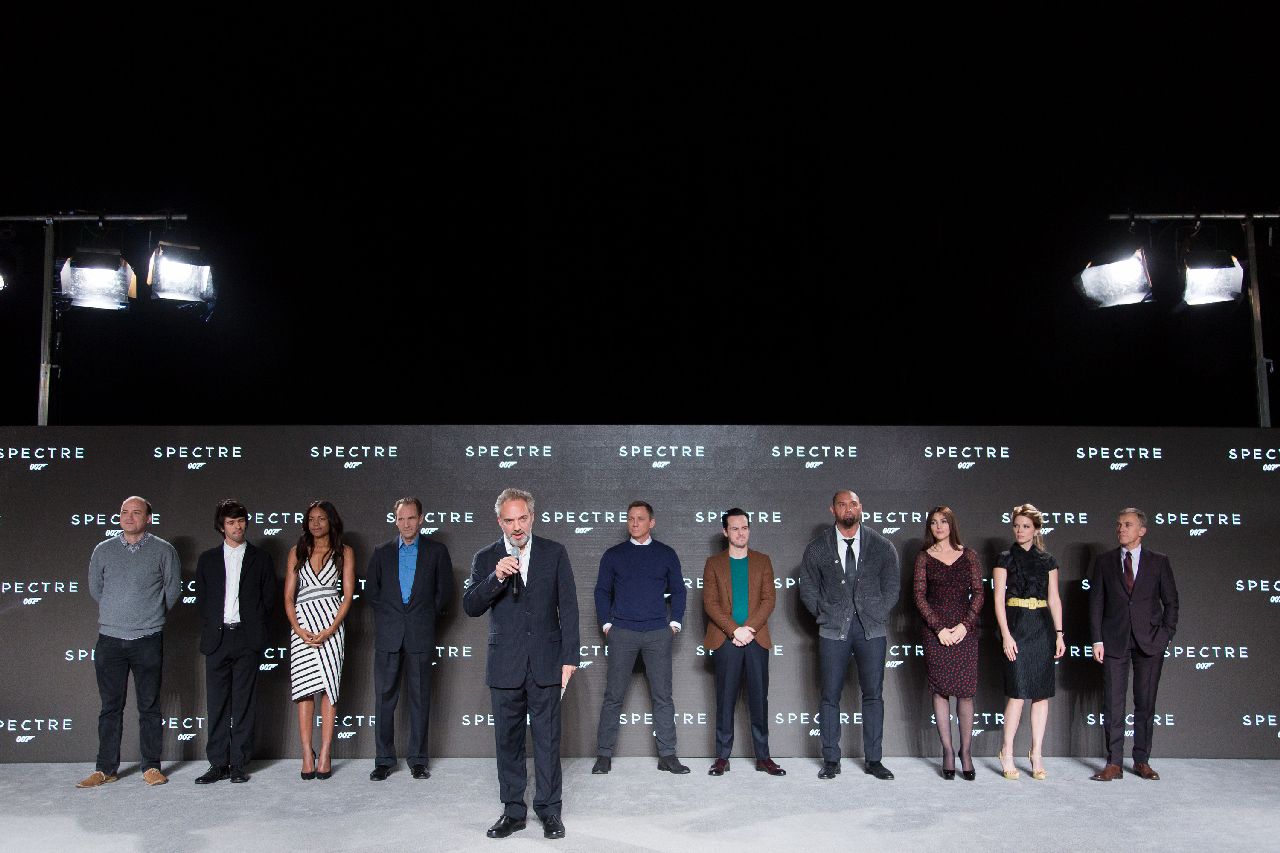 Eon Productions, Metro-Goldwyn-Mayer and Sony Pictures Entertainment announce the 24th James Bond adventure " SPECTRE. " Pictured: (L to R) Rory Kinnear, Ben Wishaw, Naomie Harris, Ralph Fiennes, Sam Mendes, Daniel Craig, Andrew Scott, Dave Bautista, Monica Bellucci, LÃ©a Seydoux, Christoph Waltz.