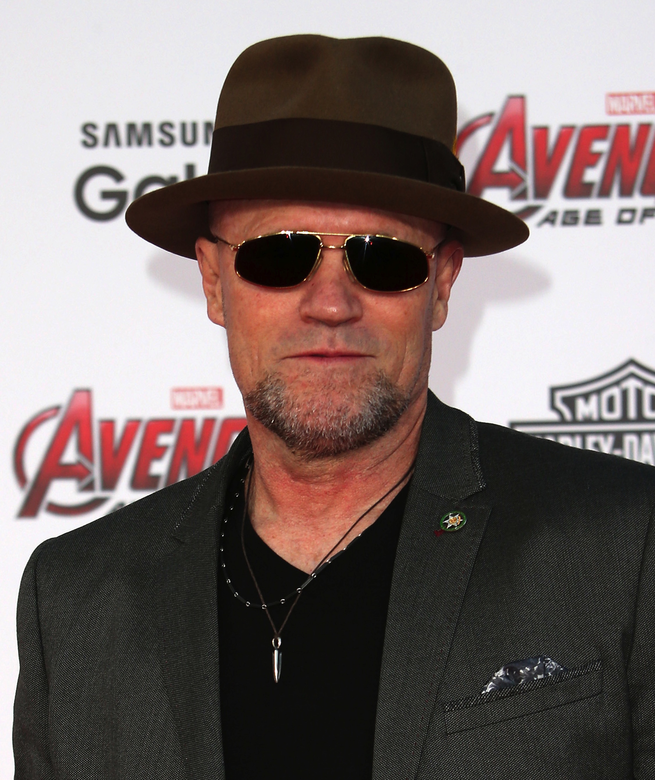 Michael Rooker as Bud Melks